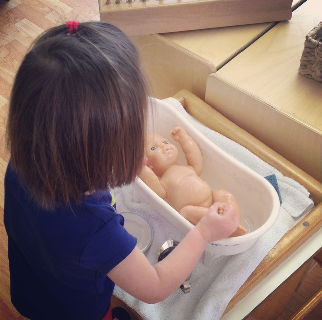 Toddler playing in a Montessori classroom in Cary, NC